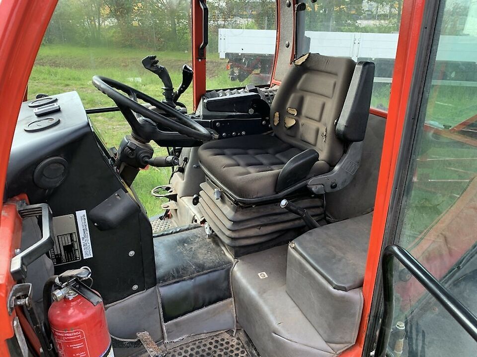Tracteur Metrac à cabine de chargeur
