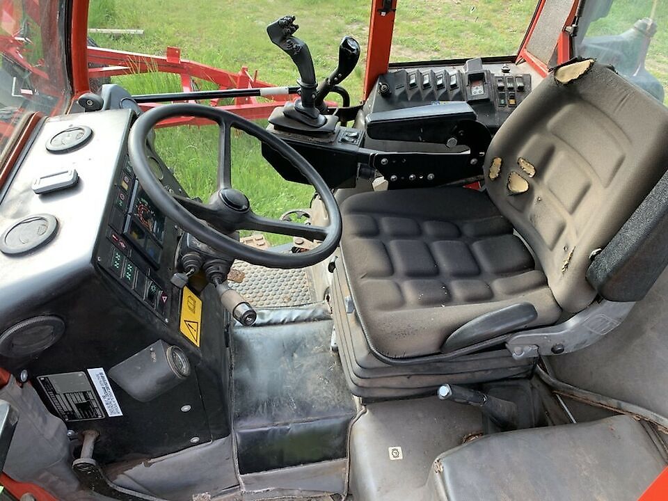 Tracteur Metrac à cabine de chargeur