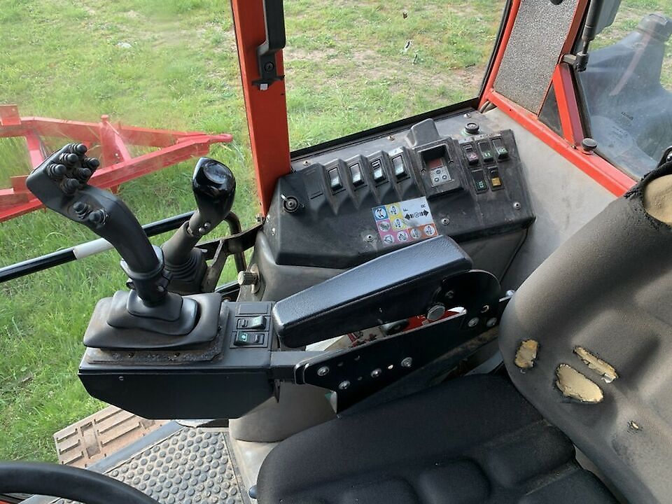 Tracteur Metrac à cabine de chargeur